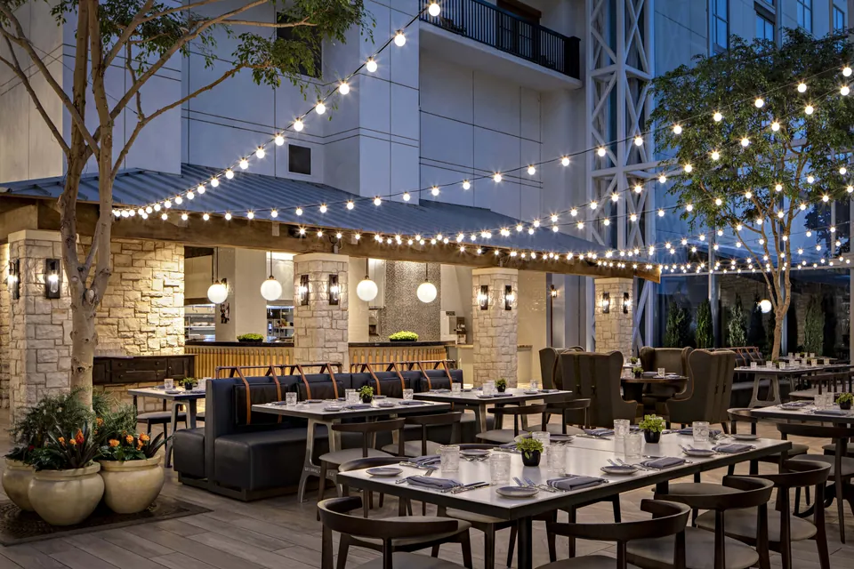 Courtyard dining under string lights